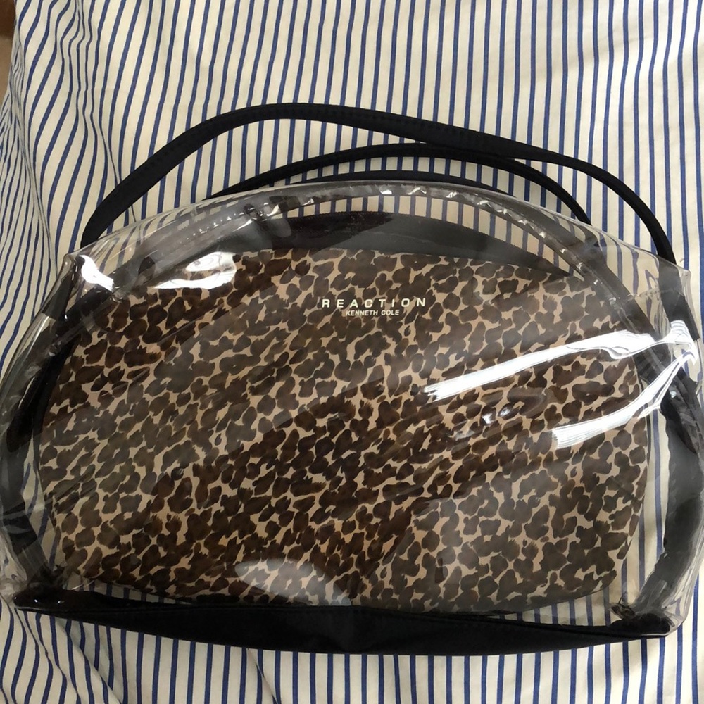Makeup bag with removable cheetah pouch